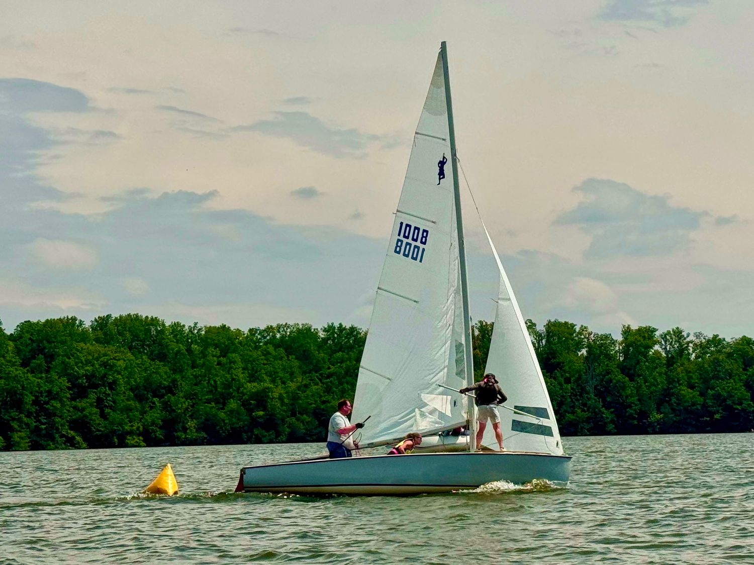 Thomas racing a sailboat